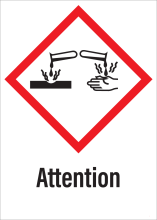 Sticker met pictogram "Bijtende Stoffen" en signaalwoord "Attention" - GHS 05